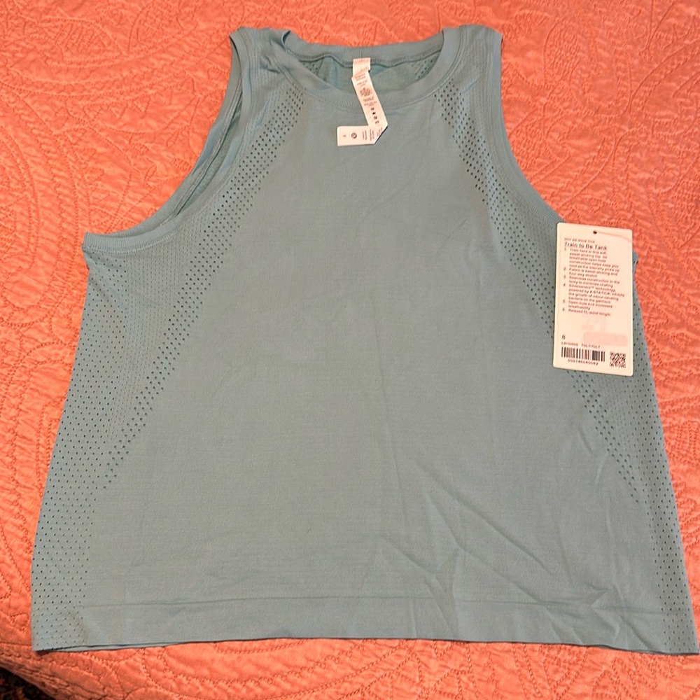 Lulu teal Train to Be Tank.
